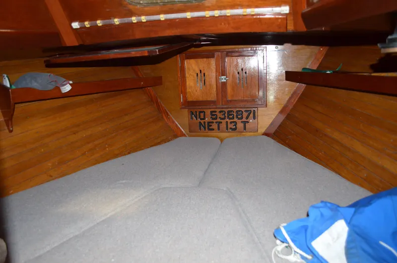 Slide: The Image of Interior of a 1963 Hinckley Bermuda 40 yacht with wooden furnishings. - 17