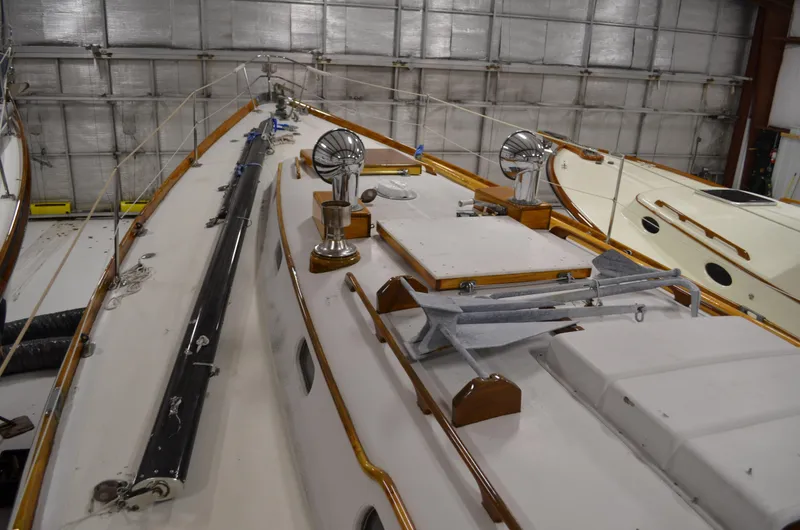 Slide: The Image of 1963 Hinckley Bermuda 40 sailboat in storage facility. - 39