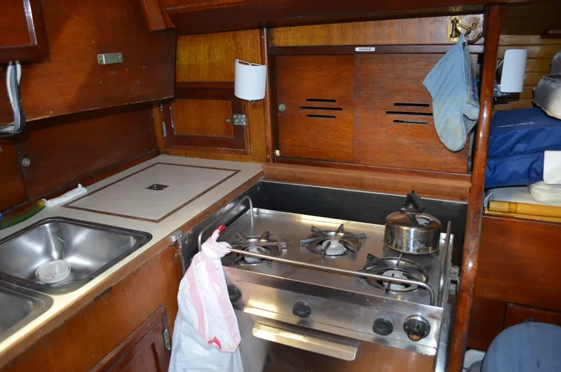 Slide: The Image of Interior of a 1963 Hinckley Bermuda 40 yacht kitchen. - 4
