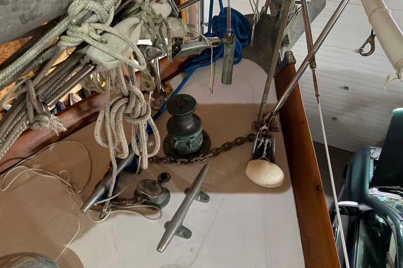 Slide: The Image of Deck of 1963 Hinckley Bermuda 40 sailboat with ropes and winch. - 41