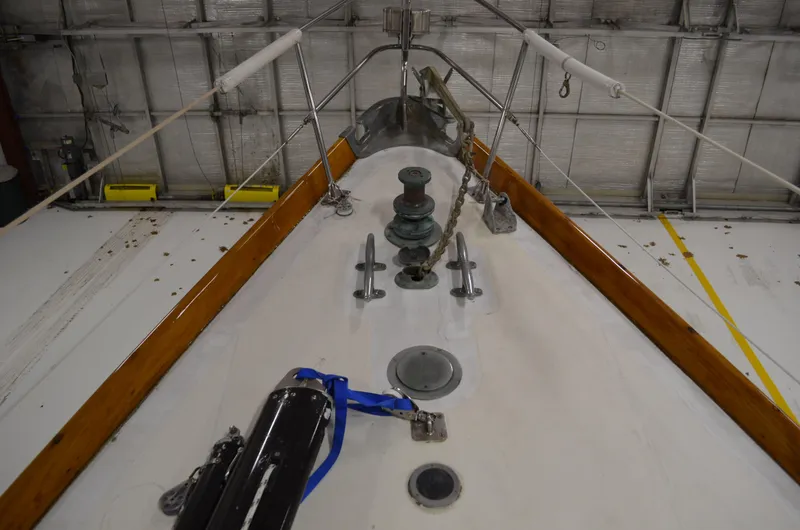 Slide: The Image of Hinckley Bermuda 40 sailboat deck, 1963 model, in a shipyard. - 44