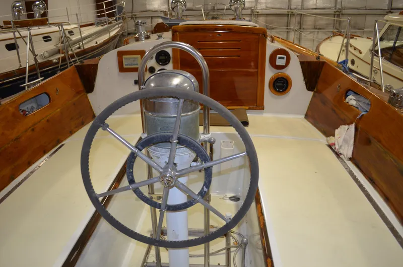 Slide: The Image of Cockpit of a 1963 Hinckley Bermuda 40 sailboat with steering wheel. - 47