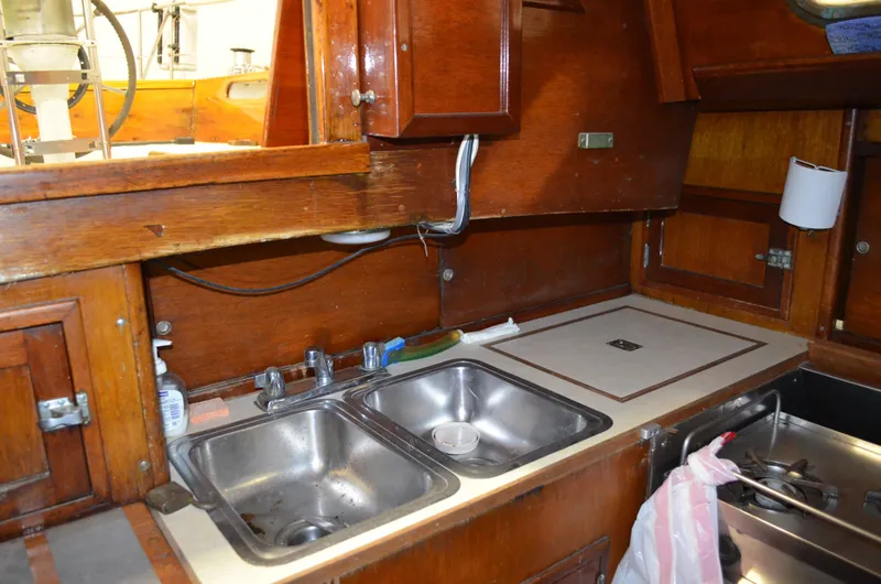 Slide: The Image of Galley area of a 1963 Hinckley Bermuda 40 yacht with double sink. - 5