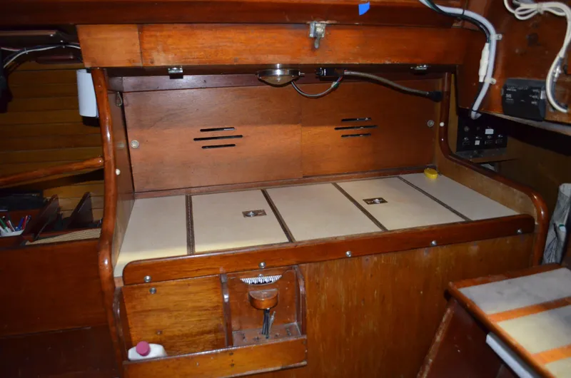 Slide: The Image of Interior of a 1963 Hinckley Bermuda 40 yacht, wooden cabinetry. - 7