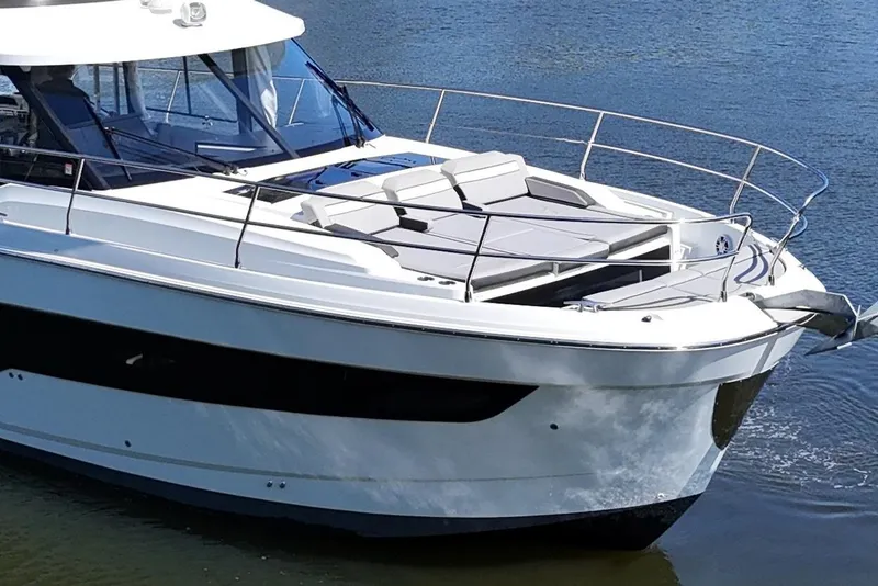 Slide: The Image of 2024 Jeanneau NC Weekender 1295 Fly yacht on calm water. - 6