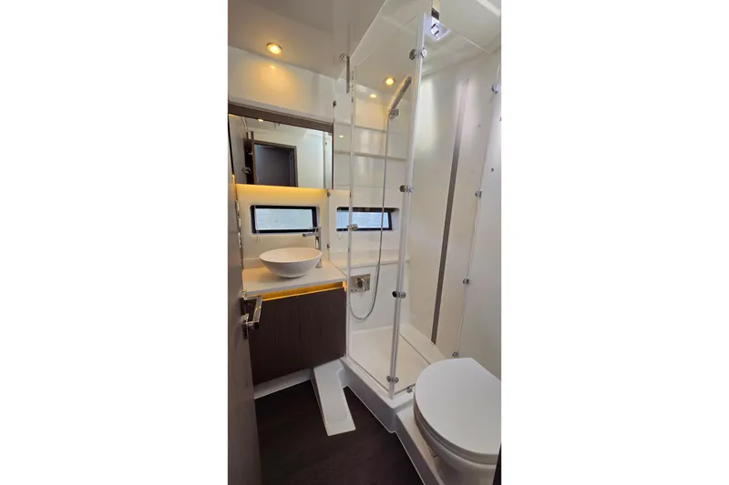 Slide: The Image of Luxurious bathroom in 2024 Jeanneau NC Weekender 1295 Fly yacht, featuring modern fixtures and elegant design. - 26