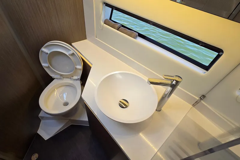 Slide: The Image of Bathroom interior of 2024 Jeanneau NC Weekender 1295 Fly with modern fixtures. - 27