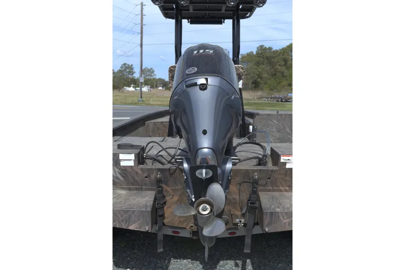 Slide: The Image of 2020 G3 Bay 20 DLX Camo boat with powerful outboard motor. - 11