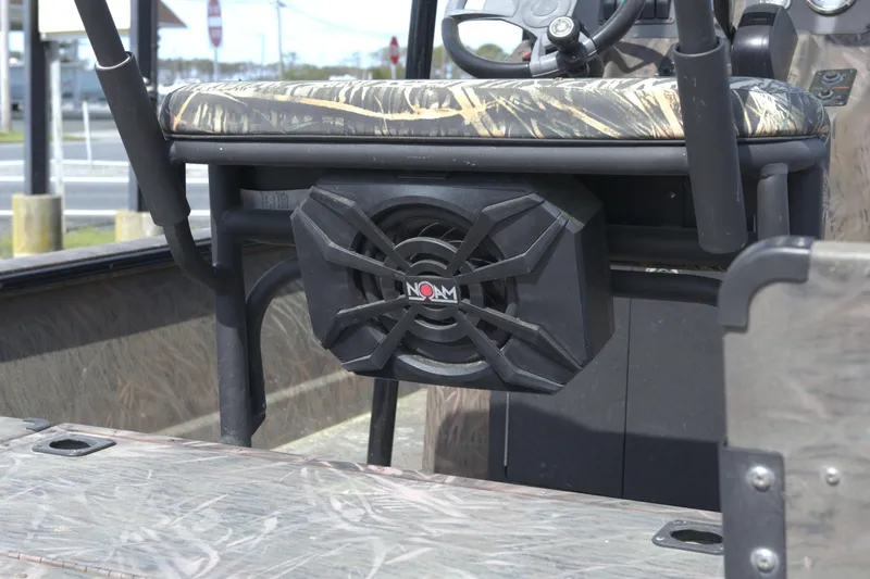 Slide: The Image of 2020 G3 Bay 20 DLX Camo boat with camo seating and mounted speaker. - 12
