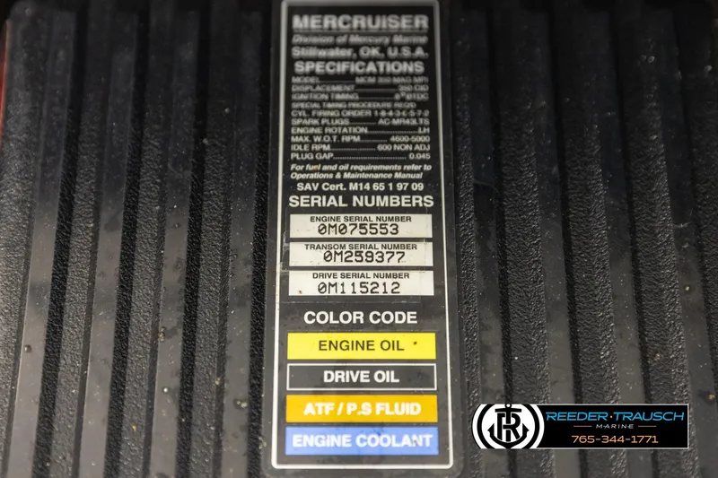 Slide: The Image of Label on a 2001 Crownline 225 BR boat engine with serial numbers and fluid color codes. - 23