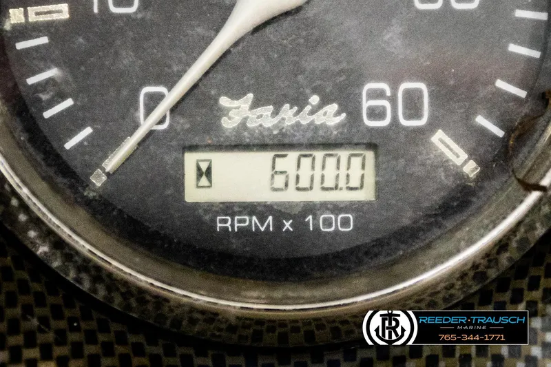 Slide: The Image of Close-up of a Faria tachometer showing 6000 RPM on a 2001 Crownline 225 BR boat. - 32