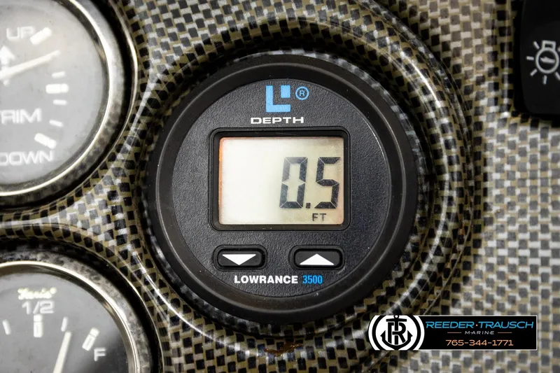 Slide: The Image of Depth gauge on 2001 Crownline 225 BR boat dashboard, displaying 0.5 feet. - 33