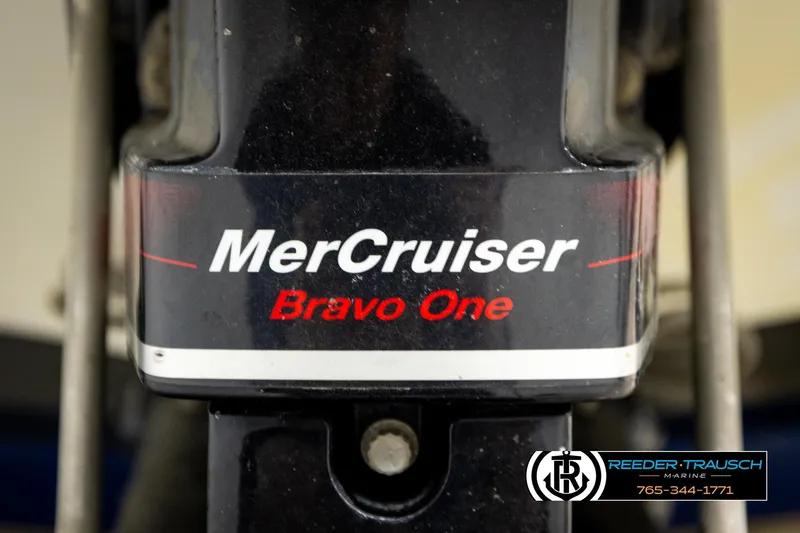 Slide: The Image of MerCruiser Bravo One engine on 2001 Crownline 225 BR boat, Reeder-Trausch Marine branding. - 44