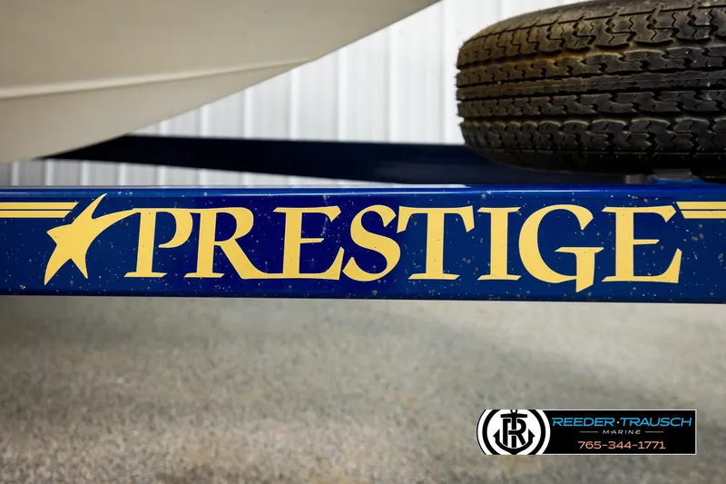 Slide: The Image of Blue Prestige boat trailer with yellow lettering, Crownline 225 BR, 2001 model. - 47
