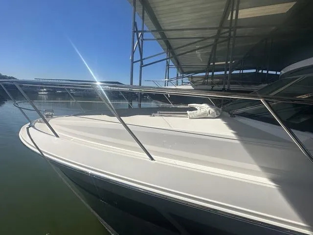 Slide: The Image of 2021 Regal 38 Grande Coupe under a dock roof. - 11