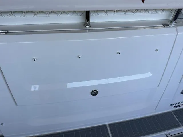 Slide: The Image of Rear view of a 2021 Regal 38 Grande Coupe yacht. - 13