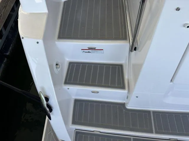 Slide: The Image of Steps of 2021 Regal 38 Grande Coupe, gray non-slip surface. - 19