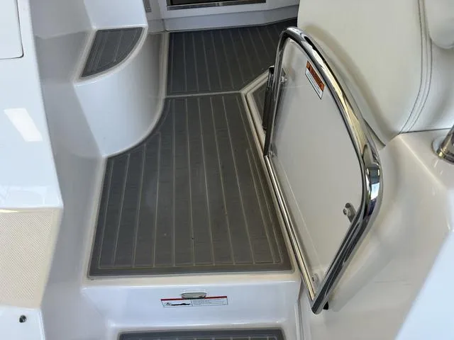 Slide: The Image of Interior of 2021 Regal 38 Grande Coupe with gray flooring. - 21