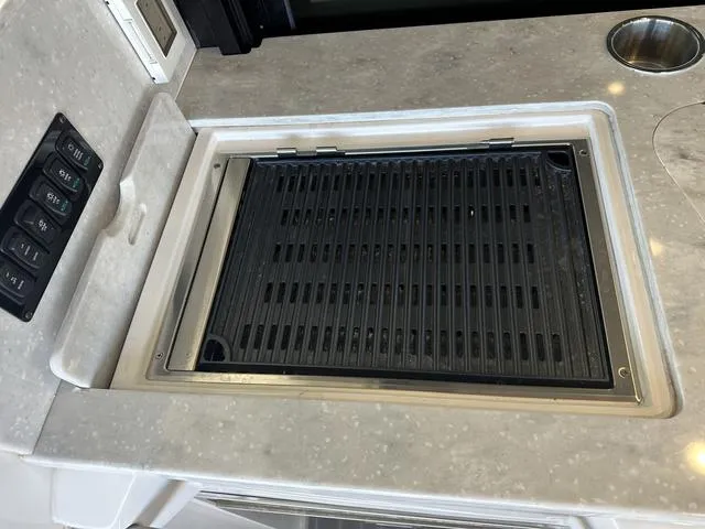 Slide: The Image of Built-in grill on Regal 38 Grande Coupe 2021. - 26
