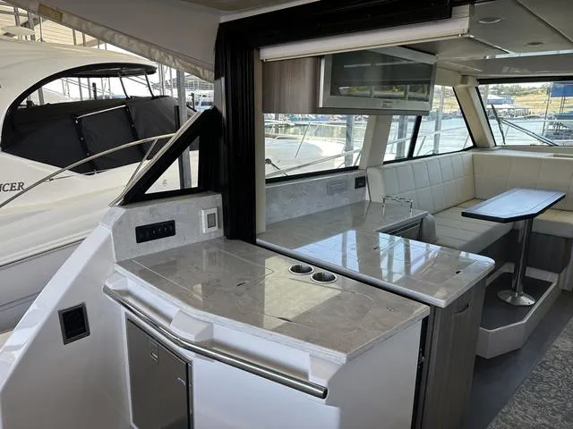 Slide: The Image of Interior of 2021 Regal 38 Grande Coupe with modern amenities. - 33