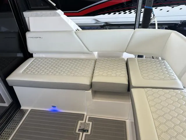 Slide: The Image of Interior of 2021 Regal 38 Grande Coupe with luxurious white seating. - 34