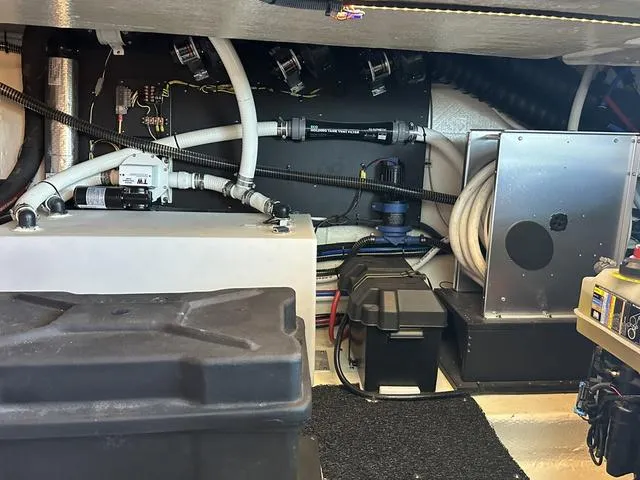 Slide: The Image of Engine room of 2021 Regal 38 Grande Coupe with technical components. - 46