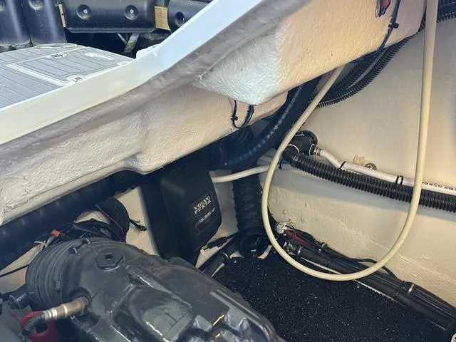 Slide: The Image of Engine compartment of 2021 Regal 38 Grande Coupe with cables and hoses. - 47