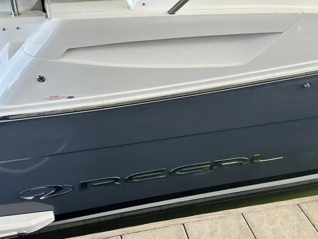 Slide: The Image of Regal 38 Grande Coupe 2021, side view of boat hull. - 5