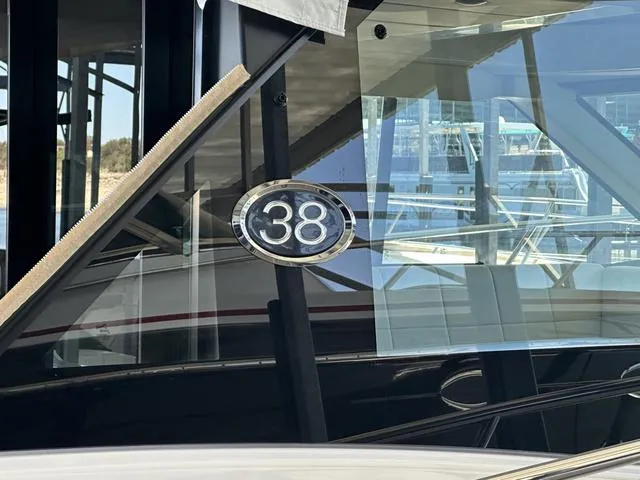 Slide: The Image of Regal 38 Grande Coupe 2021, close-up of boat window detail. - 6