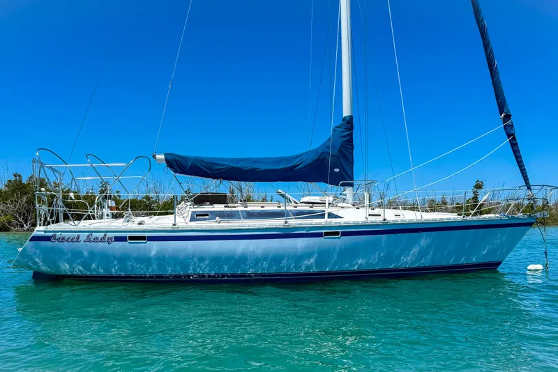Slide: The Image of 1988 Oday 40 sailboat on clear blue water under a bright sky. - 4