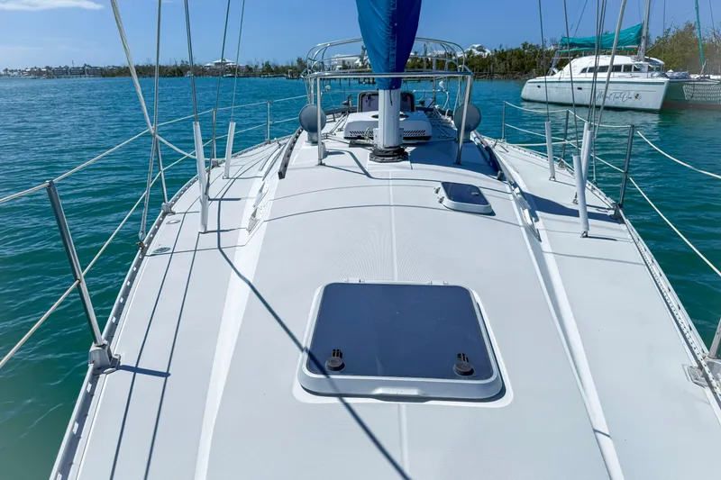 Slide: The Image of 1988 Oday 40 sailboat deck view on calm blue water. - 8
