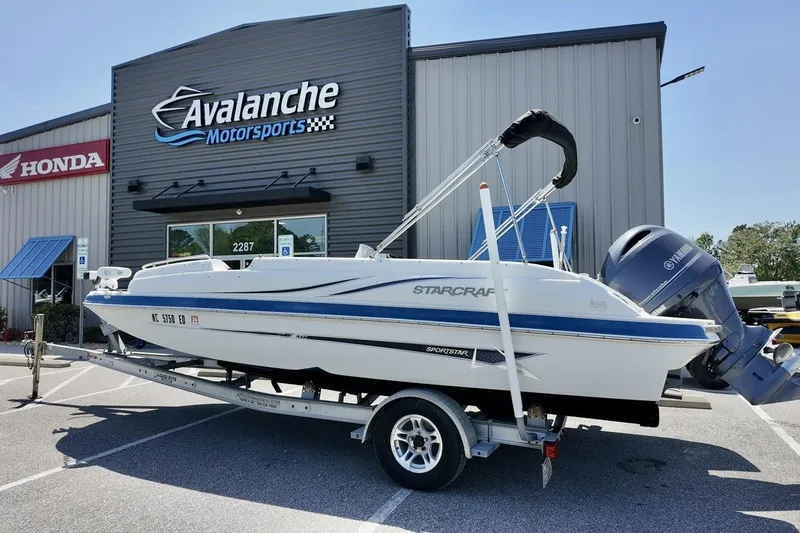 The Image of 2016 Starcraft 2000 Sportstar boat on trailer at Avalanche Motorsports dealership. - 1