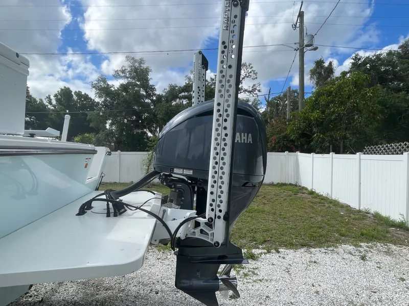 Slide: The Image of Parker 25SE boat with outboard motor, 2022 model. - 11