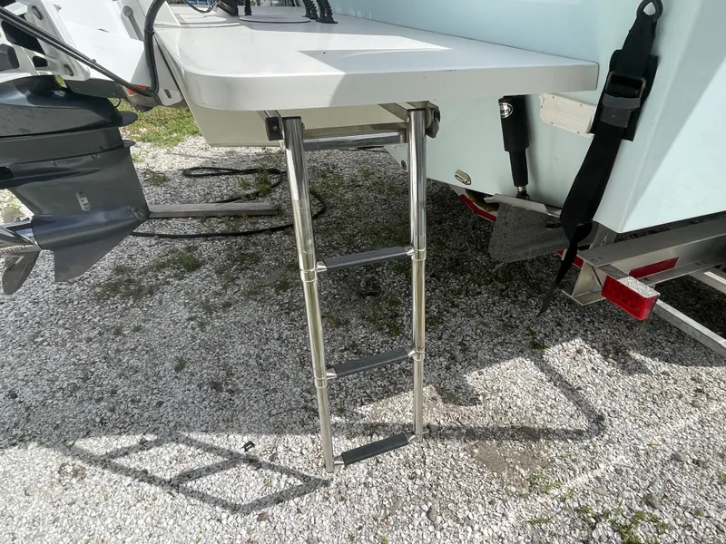 Slide: The Image of Parker 25SE boat with retractable ladder, 2022 model. - 16