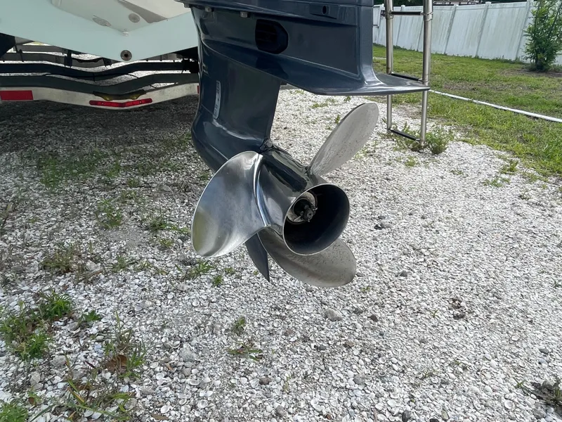 Slide: The Image of Parker 25SE boat propeller on gravel surface, year 2022. - 28