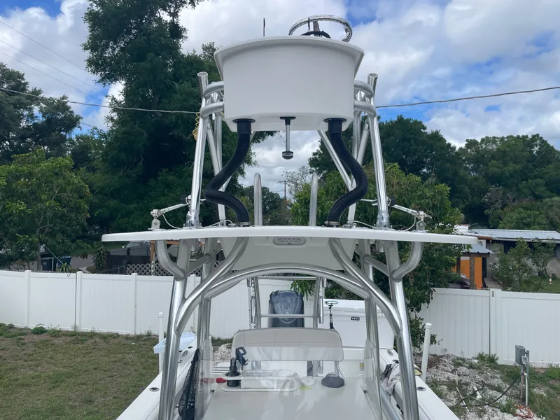 Slide: The Image of Parker 25SE boat 2022 with aluminum tower and blue sky. - 40