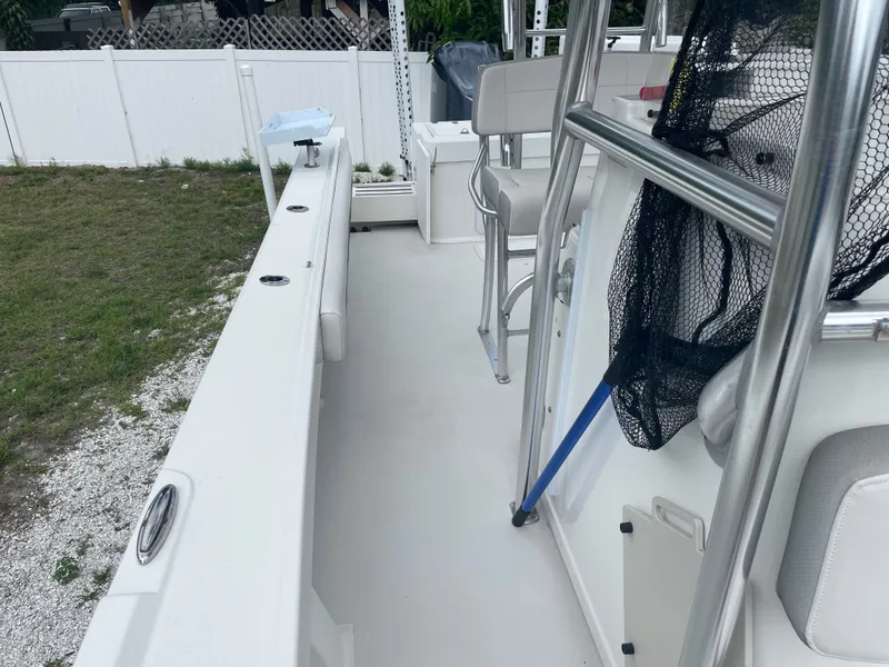 Slide: The Image of Parker 25SE boat 2022 with seating area and fishing net. - 45