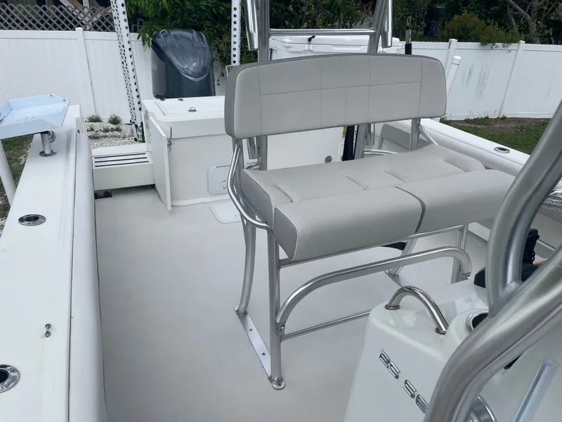 Slide: The Image of Interior of a 2022 Parker 25SE boat with seating bench. - 46
