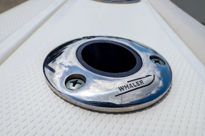 Slide: The Image of Close-up of a 2019 Boston Whaler 270 Vantage boat's chrome fitting. - 31