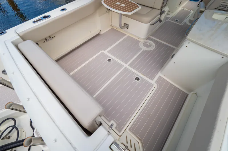 Slide: The Image of 2019 Boston Whaler 270 Vantage boat interior with seating and deck details. - 32