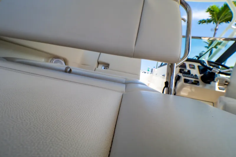 Slide: The Image of Interior view of 2019 Boston Whaler 270 Vantage boat, featuring seating and control panel. - 43