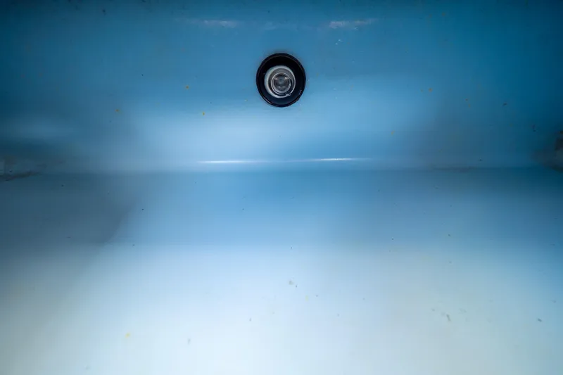 Slide: The Image of Interior view of a 2019 Boston Whaler 270 Vantage boat compartment. - 46