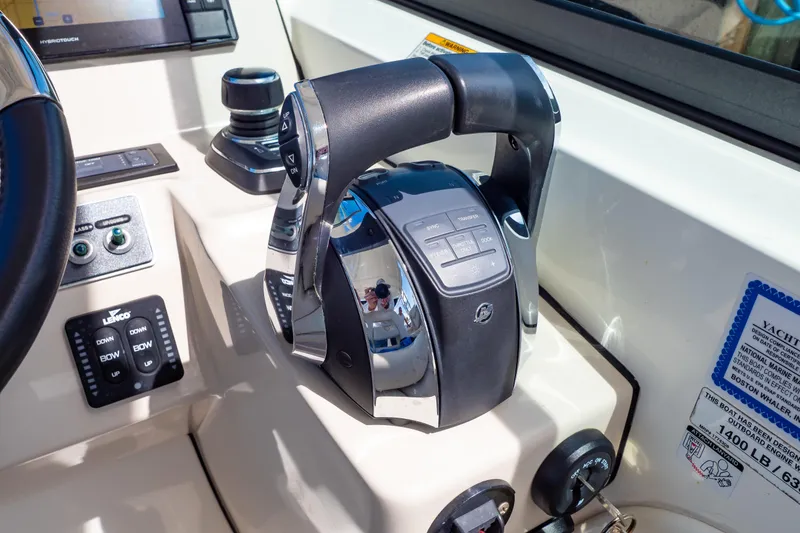 Slide: The Image of Control panel of a 2019 Boston Whaler 270 Vantage boat, featuring advanced navigation controls. - 50