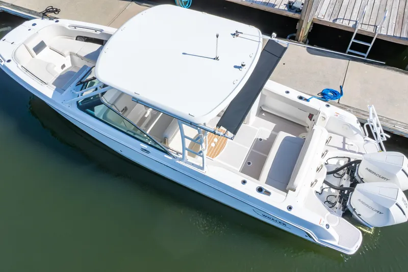 Slide: The Image of 2019 Boston Whaler 270 Vantage boat docked, aerial view. - 56