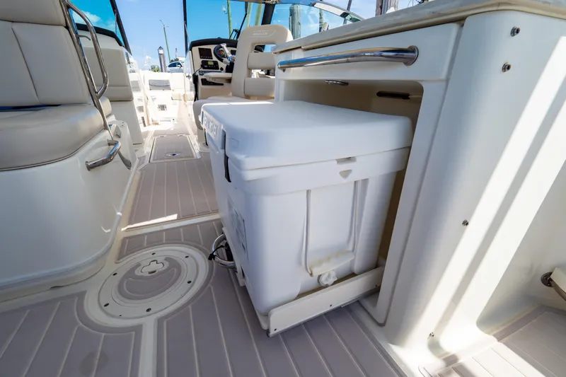 Slide: The Image of Interior of 2019 Boston Whaler 270 Vantage boat with seating and storage. - 61