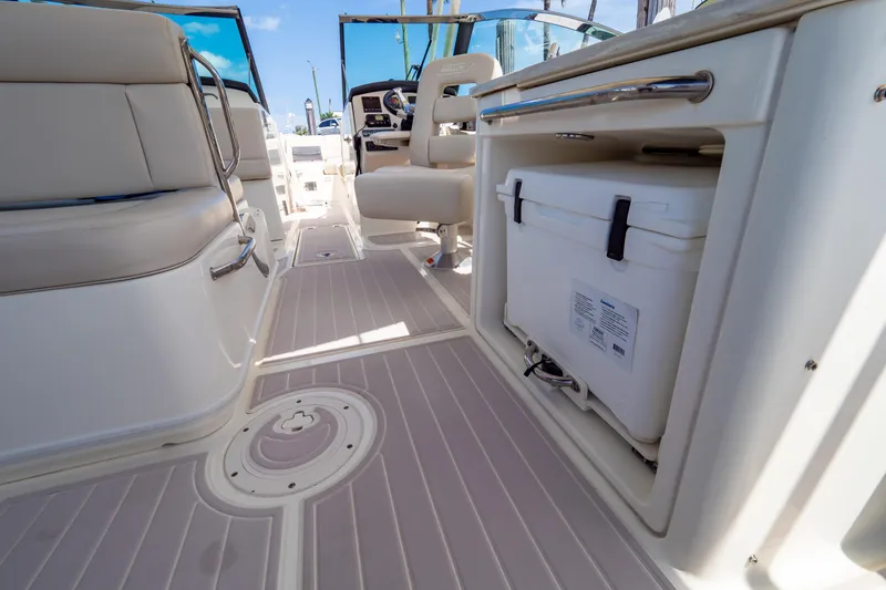 Slide: The Image of Interior view of 2019 Boston Whaler 270 Vantage boat, featuring seating and storage. - 62