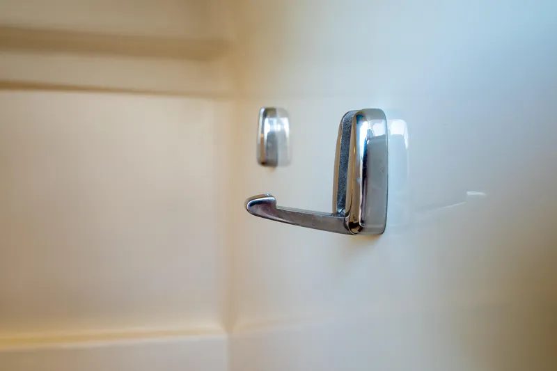 Slide: The Image of Chrome hook on Boston Whaler 270 Vantage 2019 interior wall. - 79