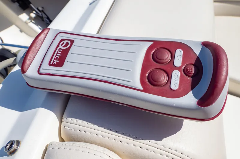 Slide: The Image of Remote control on a 2019 Boston Whaler 270 Vantage boat seat. - 84