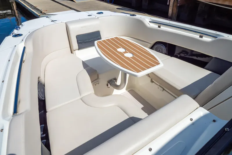 Slide: The Image of 2019 Boston Whaler 270 Vantage boat interior with seating and table. - 90