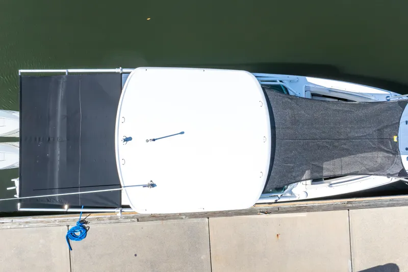 Slide: The Image of Overhead view of a 2019 Boston Whaler 270 Vantage docked by the water. - 93